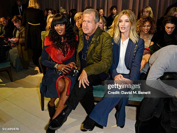 Naomi Campbell, Mario Testino and Rosie Huntington-Whiteley wearing Burberry at the Burberry Womenswear February 2016 Show at Kensington Gardens on...