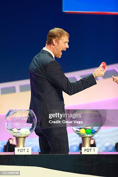 Alexi Lalas reacts after drawing the first ball of the night during the Copa America Centenario Official Draw at Hemmerstein Ballroom on February 21,...