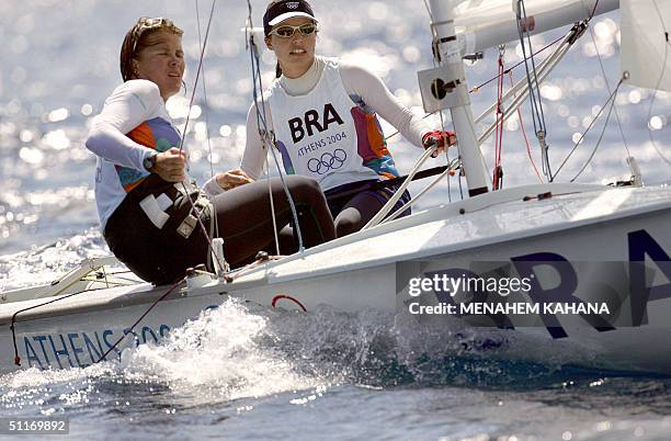 Brazilian Oliveira Fernanda and Provan Jen, sail during the Women's Double-handed Dinghy-470 second race, 14 August 2004, at the sea of Agios Kosmas...