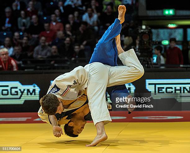 Marc Odenthal of Germany throws Yingyang Jia of China with uchi-mata for ippon to win the u90kg contest during the 2016 Dusseldorf Judo Grand Prix on...