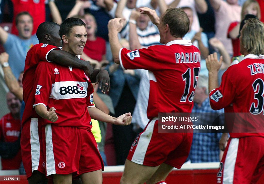 Stuart Downing of Middlesbrough (L) is c