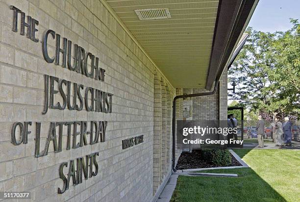 Friends and family of Lori Hacking enter a chapel of the Church of Jesus Christ of Latter-Day Saints to attend a memorial service for Lori Hacking on...