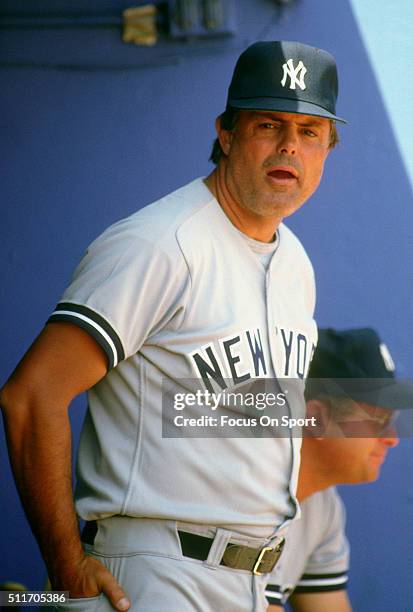 Manager Lou Piniella of the New York Yankees looks on from the dugout during an Major League Baseball game circa 1987. Piniella managed the Yankees...