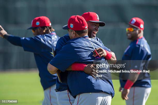 David Ortiz of the Boston Red Sox gets assistant hitting coach Victor Rodriguez on February 22, 2016 at Fenway South in Fort Myers, Florida .