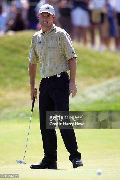 Padraig Harrington of Ireland reacts to missing a birdie putt on the 1st green during the third round of the U.S. PGA Championship at the Whistling...