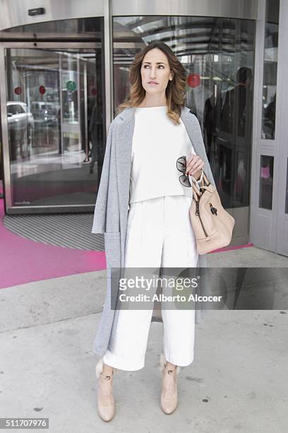 Ana Iriberri wears Loewe shoes, Loewe handbag, Vintage top and Zara coat during Mercedes Benz Fashion Week at Ifema on February 19, 2016 in Madrid,...