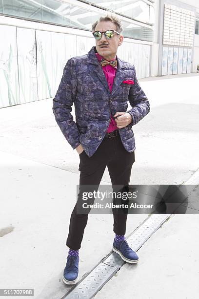 Antonio Albella wears Vintage shoes, American Vintage pants, H&M shirt, Jungle Rum Jacket and Mango Sunglasses during Mercedes Benz Fashion Week at...