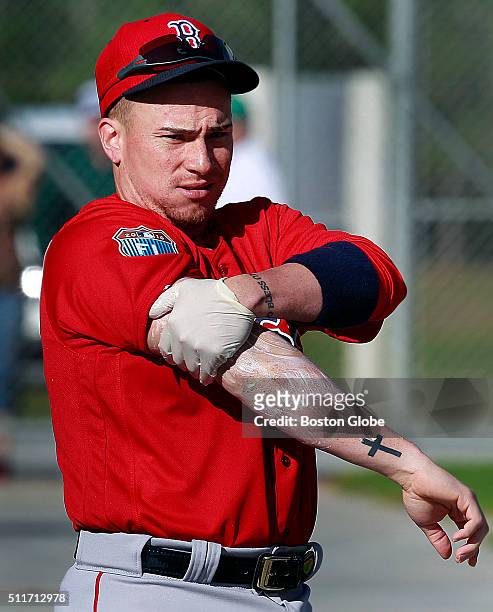 Boston Red Sox catcher Christian Vazquez rubs a cream on his right arm at JetBlue South in Fort Myers, Fla., on Feb. 19, 2016. Today is the first...