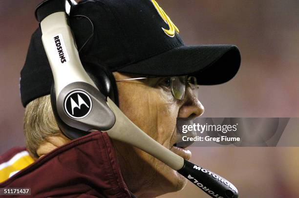 Head coach Joe Gibbs of the Washington Redskins on the sidelines during the game against the Carolina Panthers on August 14, 2004 at Fed Ex Field in...