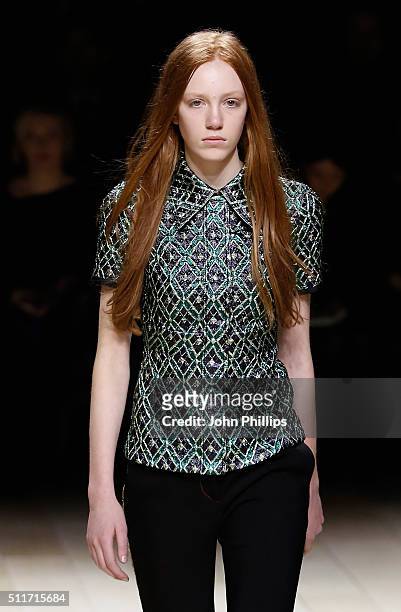 Model walks the runway at the Burberry show during London Fashion Week Autumn/Winter 2016/17 at Kensington Gardens on February 22, 2016 in London,...
