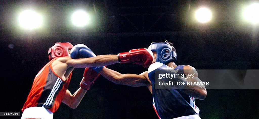Ali Sassi Mohamed Ali Sassi of Tunisia and Willi Blain of France exchange blows ...