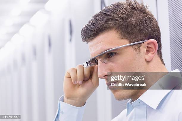 businessman working in the server room - configuring stock pictures, royalty-free photos & images