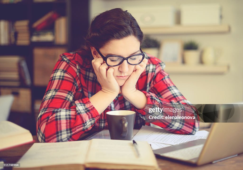 Young woman working at home