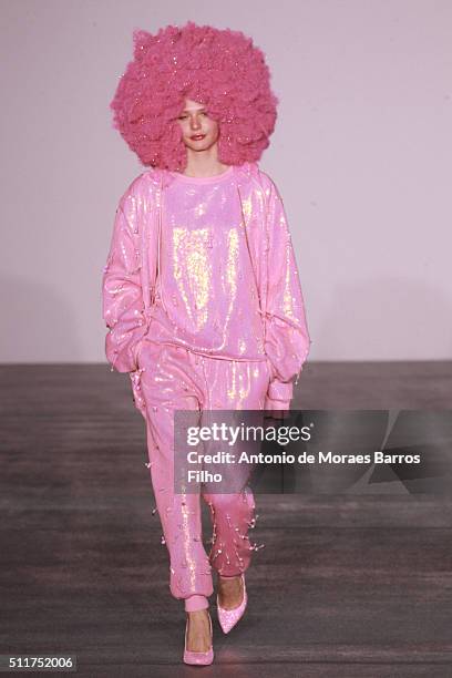 Model walks the runway at the Ashish show during London Fashion Week Autumn/Winter 2016/17 at Brewer Street Car Park on February 22, 2016 in London,...