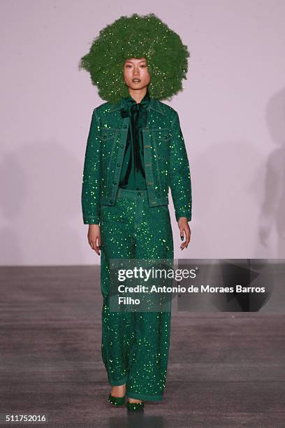 Model walks the runway at the Ashish show during London Fashion Week Autumn/Winter 2016/17 at Brewer Street Car Park on February 22, 2016 in London,...