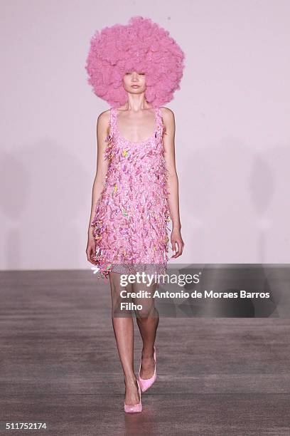 Model walks the runway at the Ashish show during London Fashion Week Autumn/Winter 2016/17 at Brewer Street Car Park on February 22, 2016 in London,...