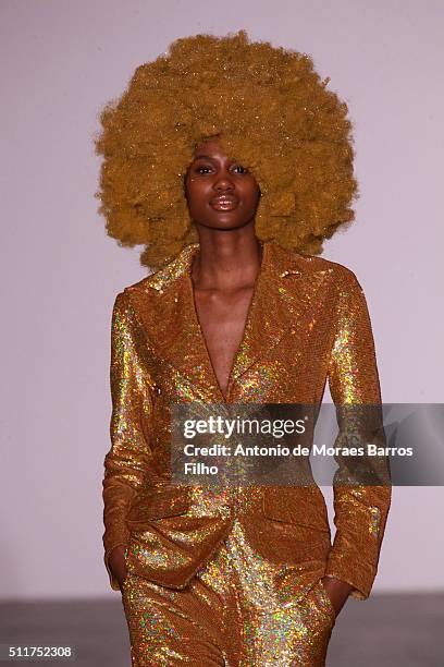 Model walks the runway at the Ashish show during London Fashion Week Autumn/Winter 2016/17 at Brewer Street Car Park on February 22, 2016 in London,...