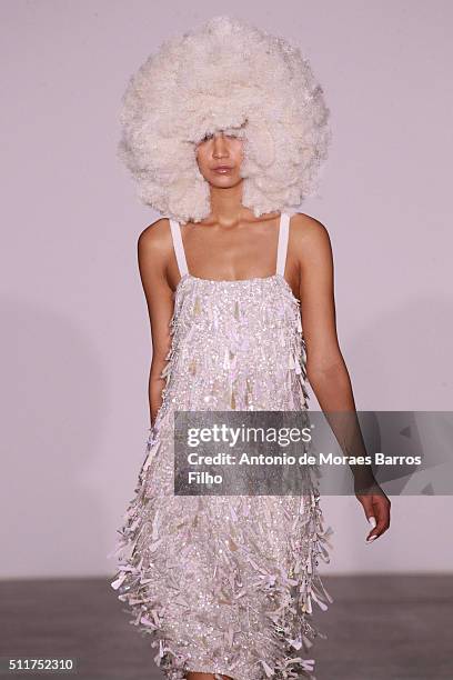 Model walks the runway at the Ashish show during London Fashion Week Autumn/Winter 2016/17 at Brewer Street Car Park on February 22, 2016 in London,...