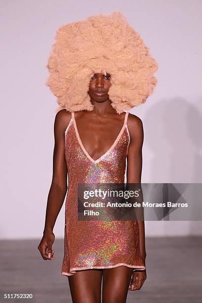 Model walks the runway at the Ashish show during London Fashion Week Autumn/Winter 2016/17 at Brewer Street Car Park on February 22, 2016 in London,...