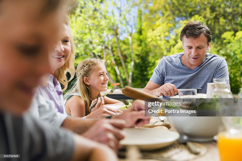Family having healthy breakfast at table