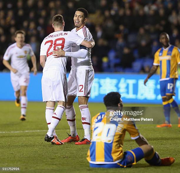Chris Smalling of Manchester United celebrates scoring their first goal during the Emirates FA Cup Fifth Round match between Shrewsbury Town and...