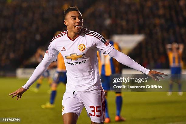 Jesse Lingard of Manchester United celebrates as he scores their third goal during the Emirates FA Cup fifth round match between Shrewsbury Town and...
