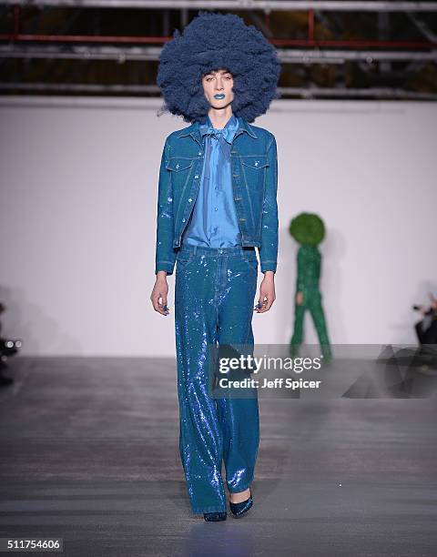 Model walks the runway at the Ashish show during London Fashion Week Autumn/Winter 2016/17 at Brewer Street Car Park on February 22, 2016 in London,...