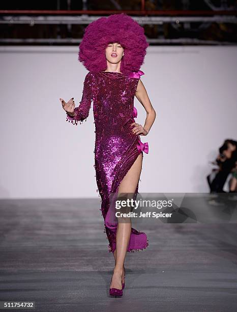 Model walks the runway at the Ashish show during London Fashion Week Autumn/Winter 2016/17 at Brewer Street Car Park on February 22, 2016 in London,...