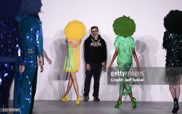 Fashion designer Ashish Gupta on the runway after his show during London Fashion Week Autumn/Winter 2016/17 at Brewer Street Car Park on February 22,...