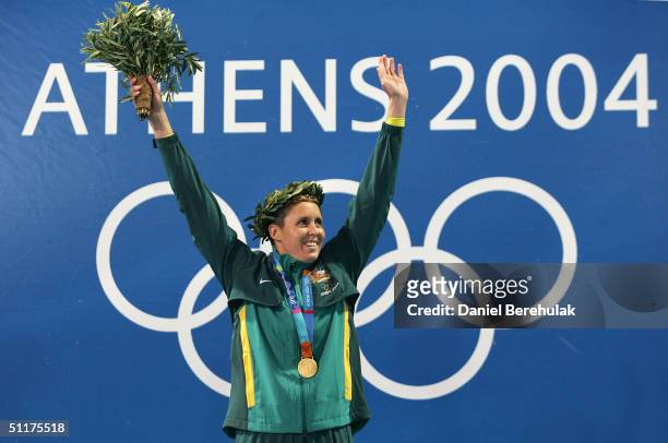 Petria Thomas of Australia holds her gold medal for the women's swimming 100 metre butterfly final on August 15, 2004 during the Athens 2004 Summer...