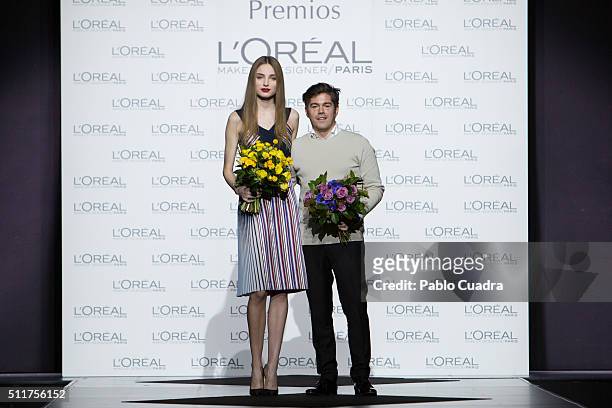 Model Paula Willems and Designer Jorge Vazquez recive the L'Oreal award during the Mercedes-Benz Madrid Fashion Week Autumn/Winter 2016/2017 at Ifema...