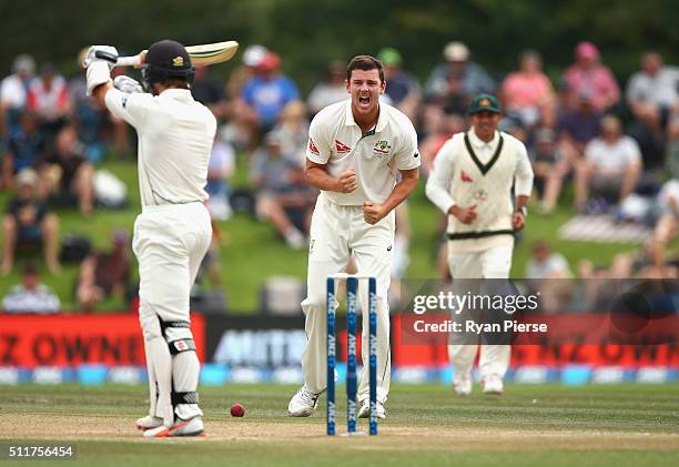 Josh Hazlewood of Australia celebrates after Umpire Ranmore Martinesz gave Kane Williamson of New Zealand out LBW as Williamson refered the decision...