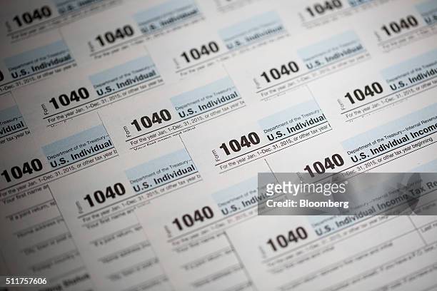 Department of the Treasury Internal Revenue Service 1040 Individual Income Tax forms for the 2015 tax year are seen in this arranged photograph taken...