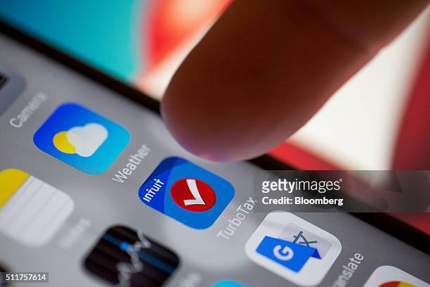 The Intuit Inc. TurboTax application is displayed on an Apple Inc. IPhone 6s in this arranged photograph taken in New York, U.S., on Feb. 15, 2016....