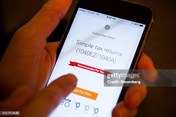 The Intuit Inc. TurboTax application is demonstrated on an Apple Inc. IPhone 6s in this arranged photograph taken in New York, U.S., on Feb. 15,...