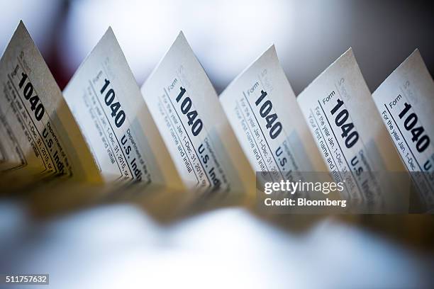 Department of the Treasury Internal Revenue Service 1040 Individual Income Tax forms for the 2015 tax year are seen in this arranged photograph taken...