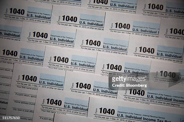 Department of the Treasury Internal Revenue Service 1040 Individual Income Tax forms for the 2015 tax year are seen in this arranged photograph taken...