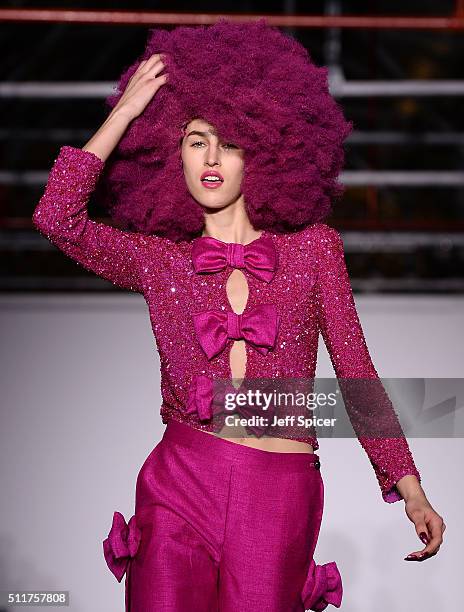 Model walks the runway at the Ashish show during London Fashion Week Autumn/Winter 2016/17 at Brewer Street Car Park on February 22, 2016 in London,...