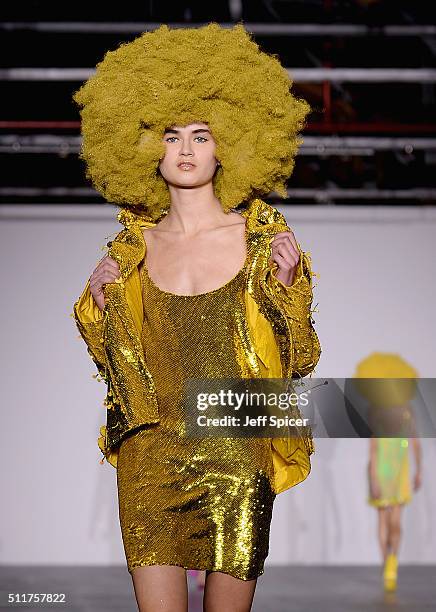 Model walks the runway at the Ashish show during London Fashion Week Autumn/Winter 2016/17 at Brewer Street Car Park on February 22, 2016 in London,...