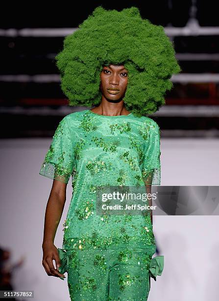 Model walks the runway at the Ashish show during London Fashion Week Autumn/Winter 2016/17 at Brewer Street Car Park on February 22, 2016 in London,...