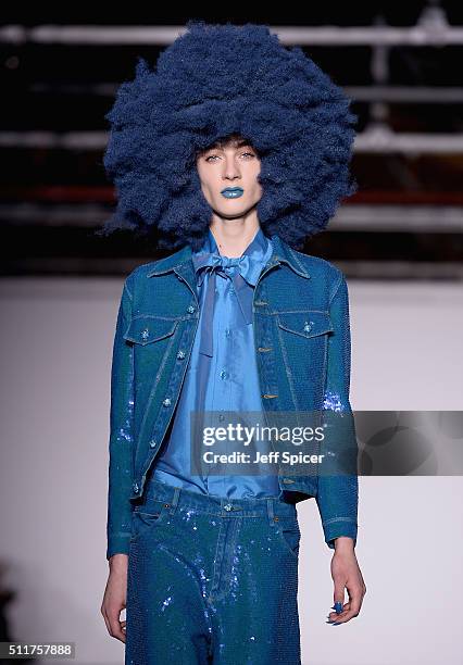 Model walks the runway at the Ashish show during London Fashion Week Autumn/Winter 2016/17 at Brewer Street Car Park on February 22, 2016 in London,...