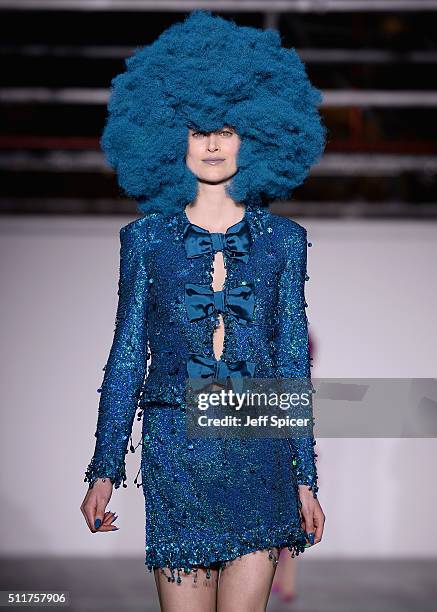 Model walks the runway at the Ashish show during London Fashion Week Autumn/Winter 2016/17 at Brewer Street Car Park on February 22, 2016 in London,...