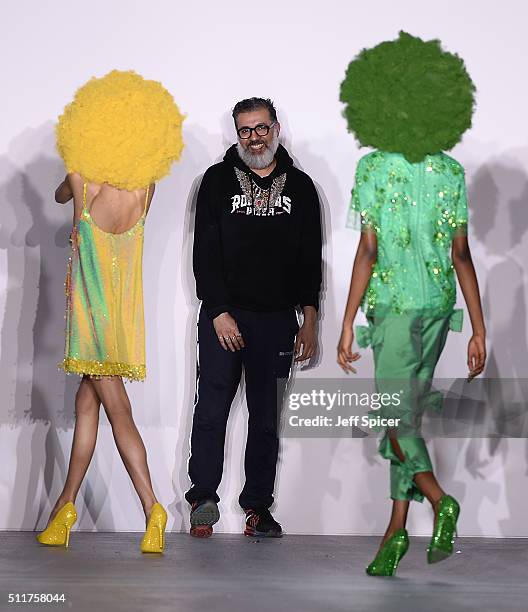 Fashion designer Ashish Gupta on the runway after his show during London Fashion Week Autumn/Winter 2016/17 at Brewer Street Car Park on February 22,...