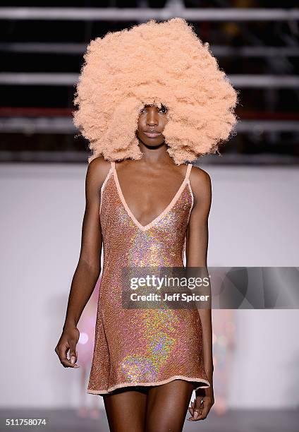 Model walks the runway at the Ashish show during London Fashion Week Autumn/Winter 2016/17 at Brewer Street Car Park on February 22, 2016 in London,...