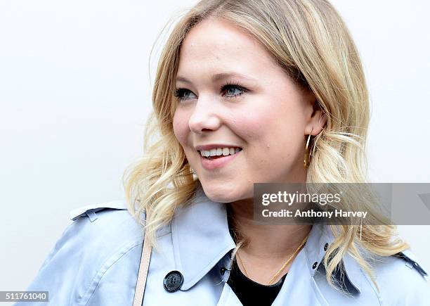 Poppy Jamie attends the Burberry show during London Fashion Week Autumn/Winter 2016/17 at Kensington Gardens on February 22, 2016 in London, England.