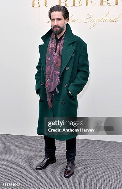Jack Guinness attends the Burberry show during London Fashion Week Autumn/Winter 2016/17 at Kensington Gardens on February 22, 2016 in London,...
