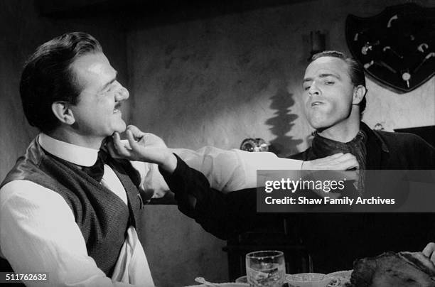 Actor and director Marlon Brando with co-star Karl Malden circa 1959 during the filming of "One-Eyed Jacks" in Los Angeles, California.