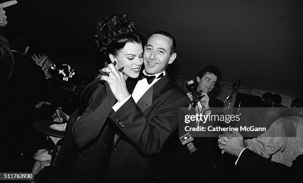 Opening of the Andy Warhol Museum in May 1994 in Pittsburgh, PA. L-R: Debi Mazar dances with Paul Reubens, aka Pee-Wee Herman.