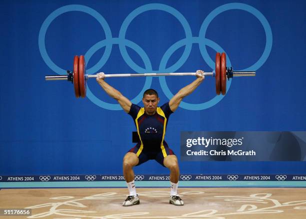 Jose Israel Rubio of Venezuala competes in the men's 62 kg Group B category weightlifting competition on August 16, 2004 during the Athens 2004...