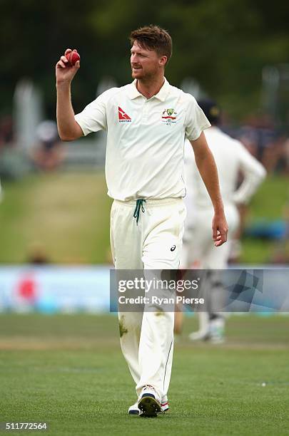 Jackson Bird of Australia raises the ball after finishing with five wickets during day four of the Test match between New Zealand and Australia at...